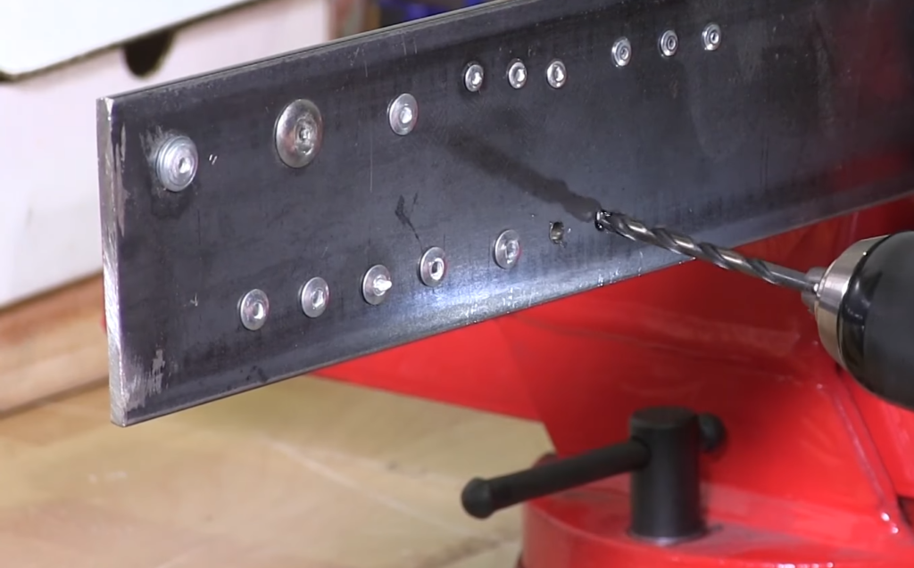 What do you have to consider when drilling into steel beams?